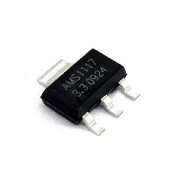 AMS1117 3.3V Regulator 3V3 Regulator - a black SOT-223 surface-mount electronic component with three metal pins and a large heat sink tab, labeled "AMS1117 3.3 0924".