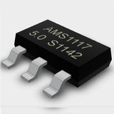 AMS1117 5V AMS1117-5V AMS1117 LM1117 1117 Voltage Regulator - a black electronic component with three metal pins and the text "AMS1117 5.0 S1142" printed on its top surface.