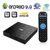 Android Smart Tv Box T9 4GB + 64GB Quad Core 4k Ultra HD 9.0 v - a black, textured square media player with a digital clock display and a matching black remote control.