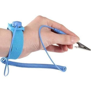 Anti-static ESD Wrist Strap With Grounding Wire – Electrostatic Discharge Protection Bracelet - shown as a blue fabric wristband with a coiled cord and a metal alligator clip held by a hand.
