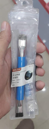 Antistatic Brush For PCB Cleaning - shown in its original plastic packaging with a blue handle and two distinct brush heads at either end.