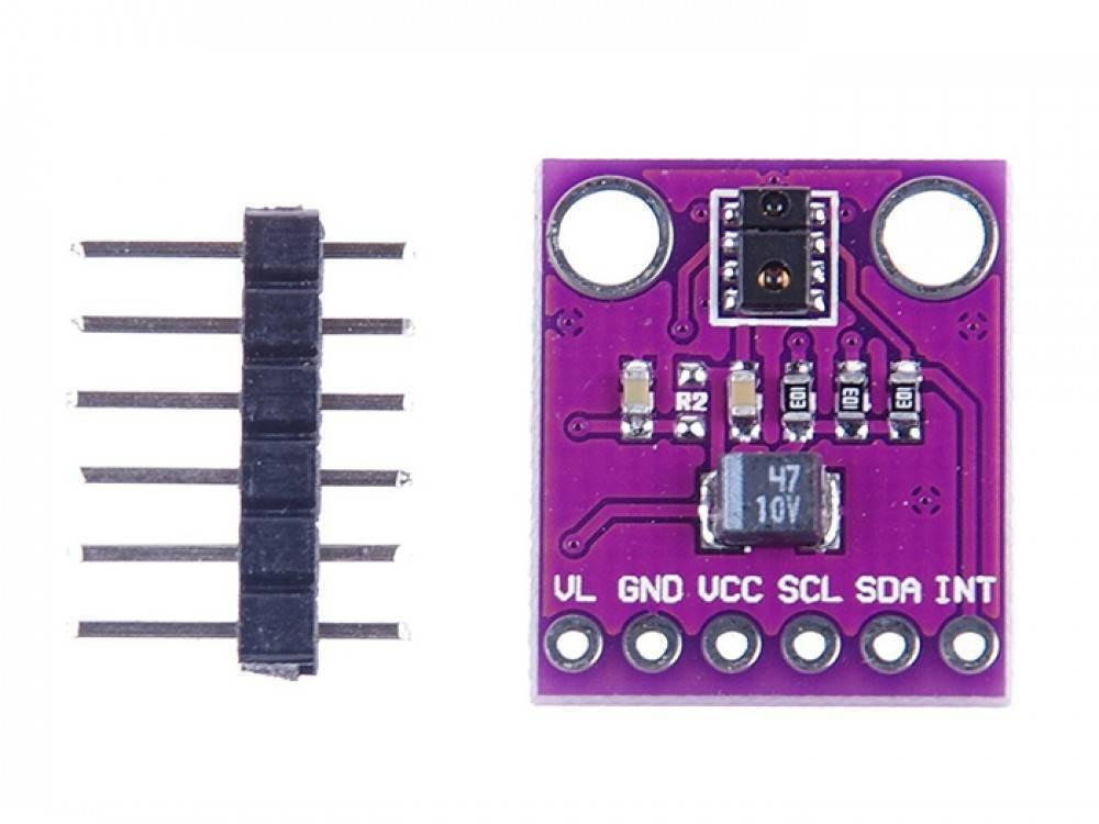 Apds-9930 RGB Infrared Gesture Sensor - a purple circuit board with six pin labels and a separate six-pin header strip.