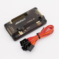 APM2.8 Multicopter Flight Controller - a rectangular black board with labeled input/output pins, a GPS port, and a bundle of multi-colored jumper wires.