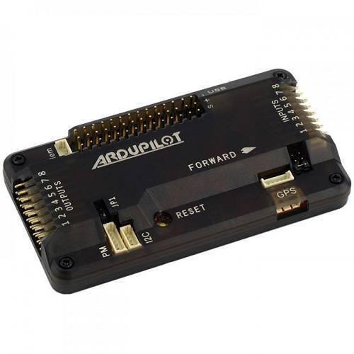 APM2.8 Multicopter Flight Controller - a black rectangular circuit board with labeled input, output, GPS, I2C, and power module ports and a reset button.
