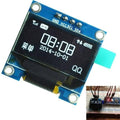 Arduino 0.96 Inch OLED Display Module 128x64 I2c SSD 1306 LCD Screen White Background - a blue circuit board with a screen displaying time, date, and icons, plus a breadboard setup in the corner.