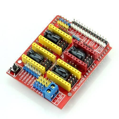 Arduino CNC Shield V3 A4988 DRV8825 Driver Expansion Board - a red rectangular circuit board with yellow and red pin headers, a blue terminal block, and button.