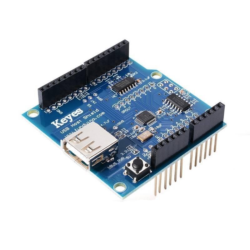 Arduino Compatible USB Host Shield - shown as a blue circuit board with a USB port, a black reset button, and black pin headers on a white background.