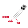 Arduino IR Receiver 3 Pin 38kHz Receiver - a silver-cased electronic component with three metal pins labeled as Signal, GND, and VCC.