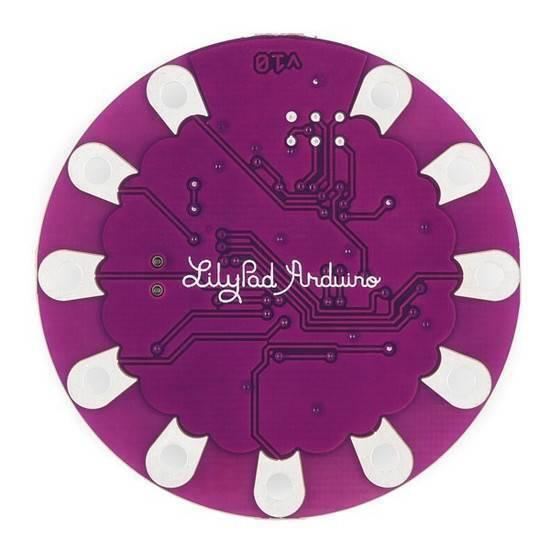 Arduino Lilypad ATMEGA32U4 - a circular, purple printed circuit board featuring a white "Lilypad Arduino" logo and silver-plated connection pads.