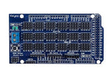 Arduino Mega Sensor Shield - a blue rectangular circuit board featuring numerous pin headers, a reset button, a terminal block, and various labeled ports.