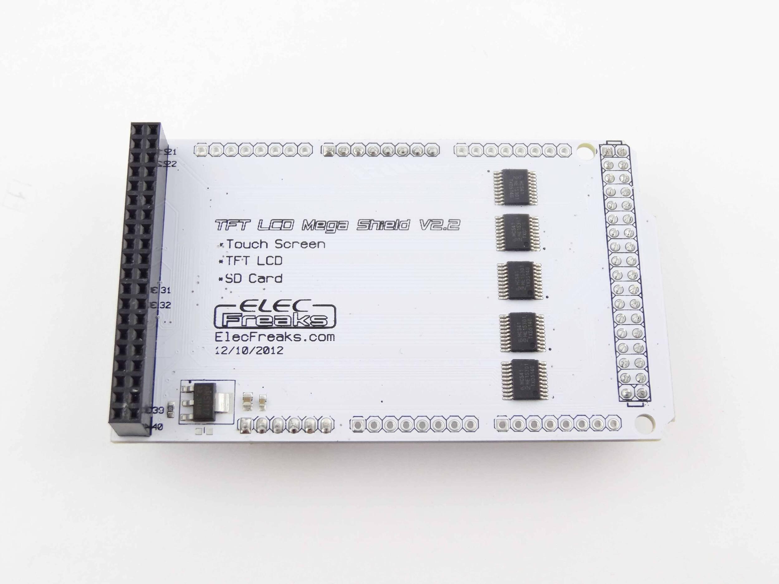 Arduino Mega TFT LCD Shield - a white rectangular circuit board with a black pin header, five integrated circuits, and a vertical row of pin sockets.