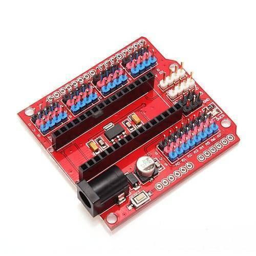 Arduino Nano Sensor Shield Nano I/o Expansion Board Prototype Shield - a red circuit board featuring multiple pin headers, a power jack, and a reset button.