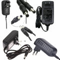 Arduino Power Supply AC DC 12V 1A Switching Adapter Power Supply Regulated - shown as a collage of black power adapters with various plug types and DC barrel connectors.
