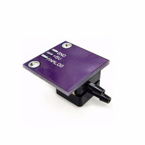 Arduino Pressure Sensor Module MPXV7002DP - a purple rectangular circuit board with two black nozzle ports and labels for GND, +5V, and ANALOG.
