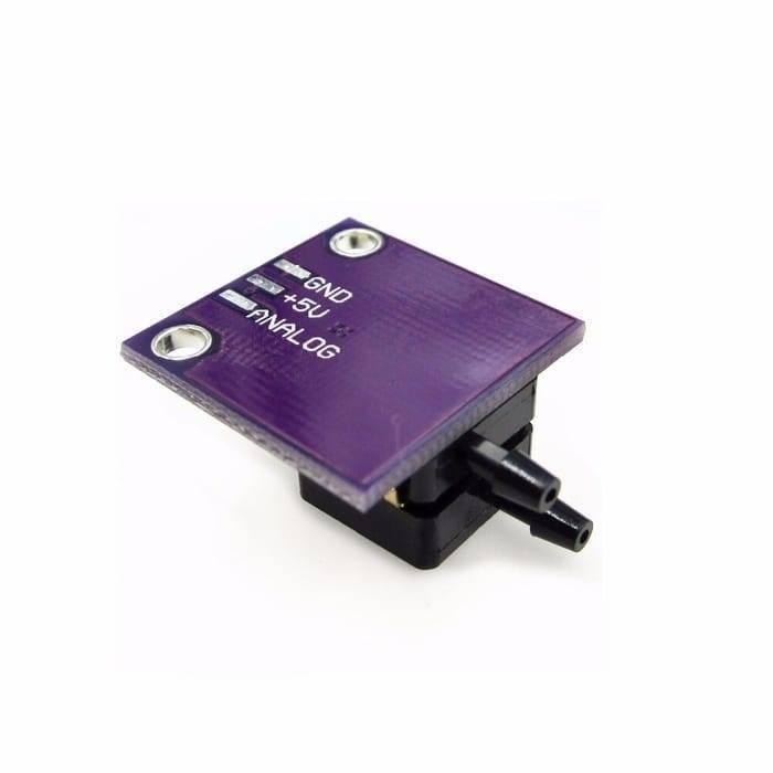 Arduino Pressure Sensor Module MPXV7002DP - a purple rectangular circuit board with two black nozzle ports and labels for GND, +5V, and ANALOG.