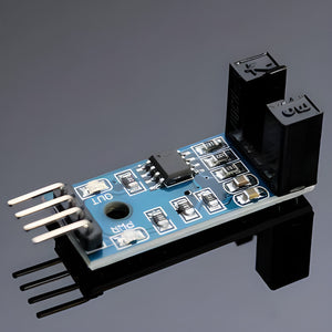 Arduino RPM Sensor Rotational Speed Measuring Sensor - a blue circuit board, a black U-shaped optical sensor, and four metal output pins.