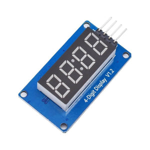 Arduino TM1637 4 Digit 7 Segment Display Module LED Display Module - a blue rectangular circuit board featuring a black four-digit LED display and four vertical header pins.