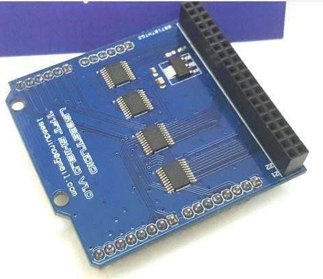 Arduino Uno LCD TFT Shield For 40-pin 8bit TFT LCD - a blue rectangular circuit board featuring four integrated circuits and a black 40-pin header connector.