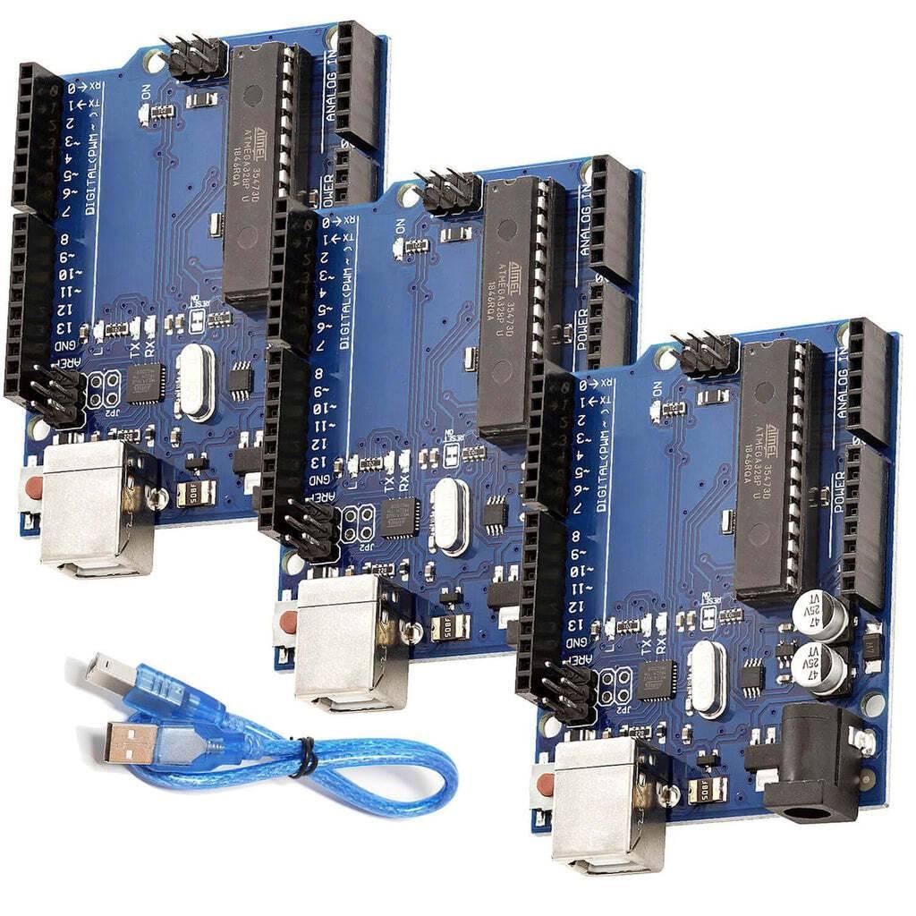 Arduino Uno R3 DIP With USB Cable Without Arduino Logo - three blue microcontroller boards with USB ports and a blue USB cable.