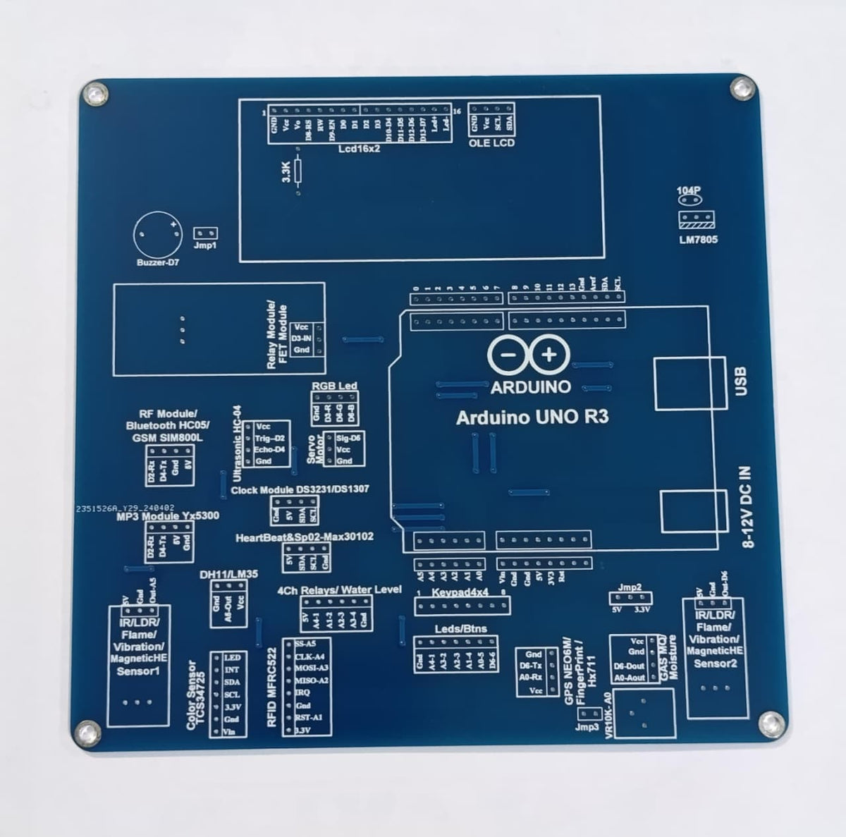 Arduino Uno R3 Training Development Board – Ultimate Sensor Learning Kit - a blue square PCB featuring a central Arduino Uno R3 socket, various sensor headers, and labeled component ports.