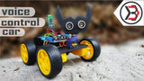 Arduino Voice Controlled kit - assembled as a four-wheeled robot with yellow wheels, a black bat-shaped ultrasonic sensor head, and a Bluetooth module.