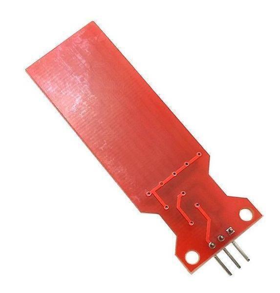 Arduino Water Level Sensor - a red rectangular PCB with exposed conductive traces and three connection pins at the base.