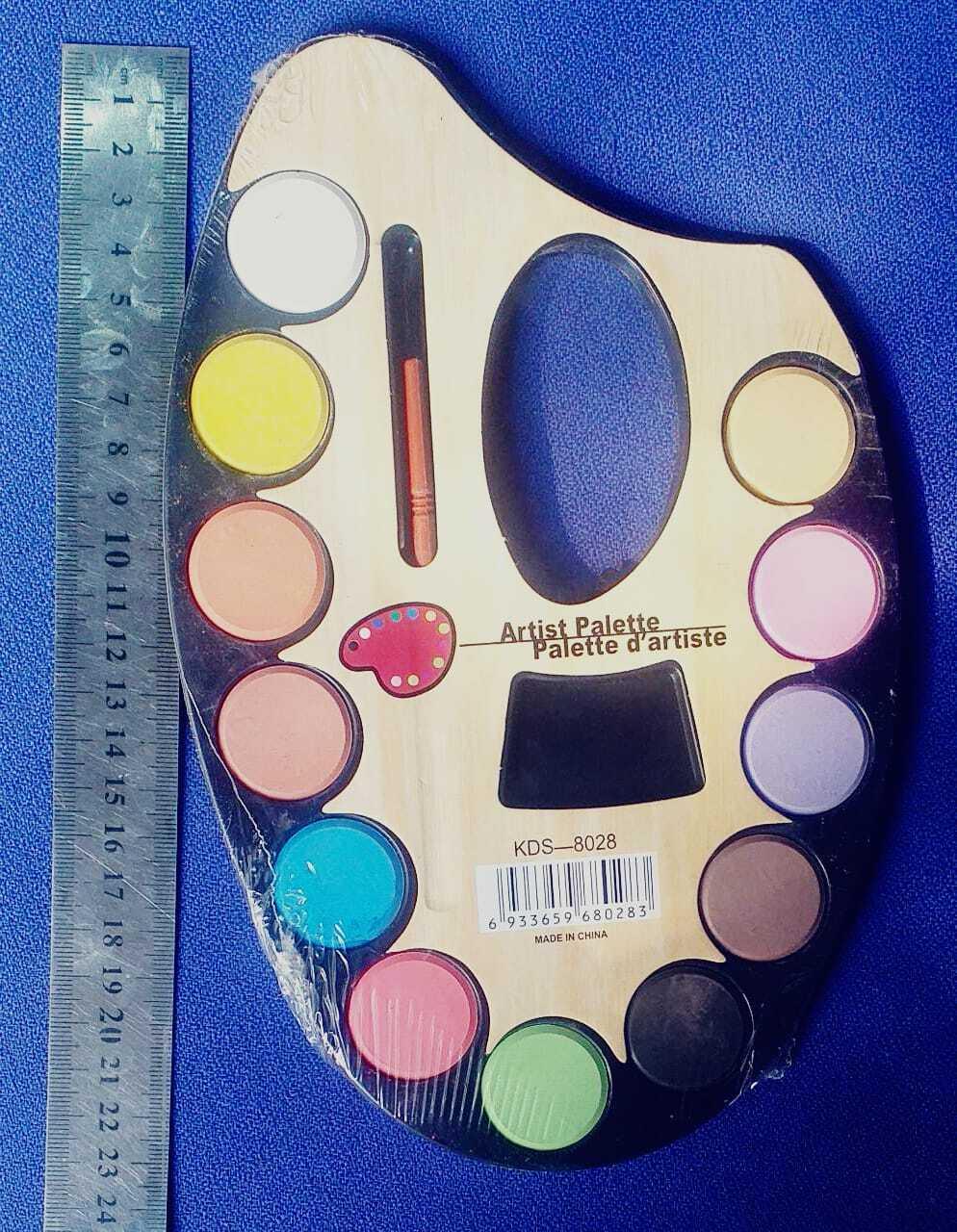 Artist Palette 12 Water Color Paints For Kids - Large Water Colors 12 Color - Brush - a wooden palette with twelve paint circles, a brush, and a ruler measuring the item's length.