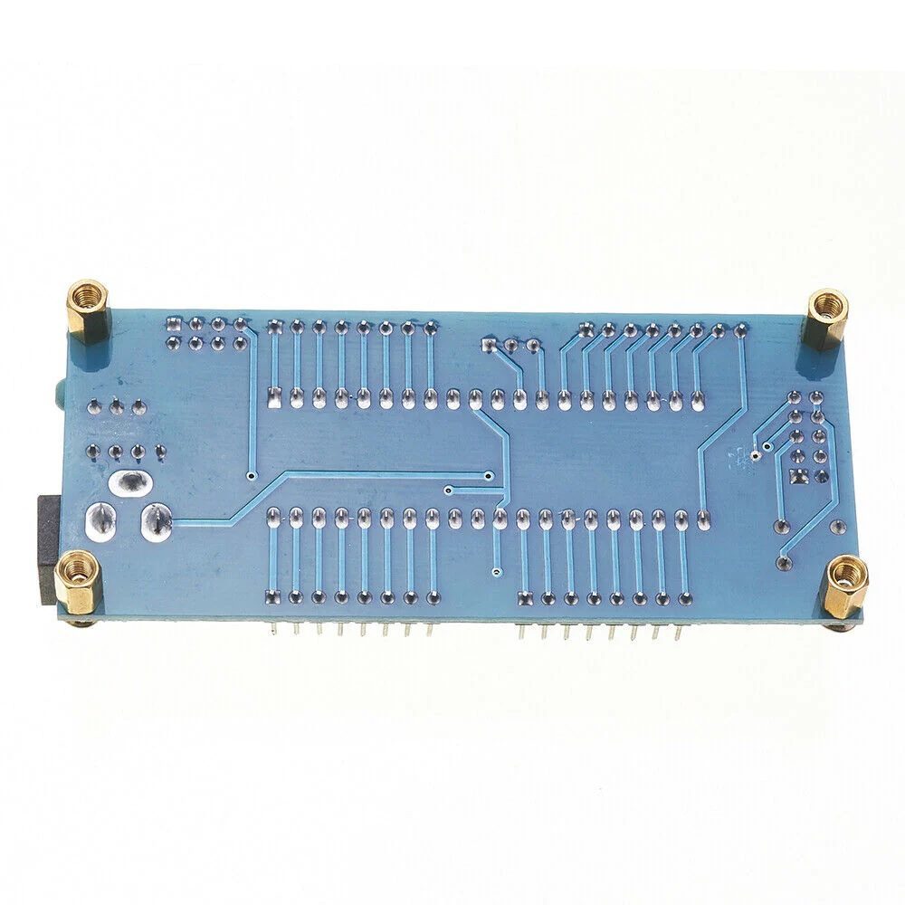 ATMEGA16 ATMEGA32 Isp Avr Minimum Development System Board Module - the blue underside of the PCB with soldered pins and four brass standoffs.