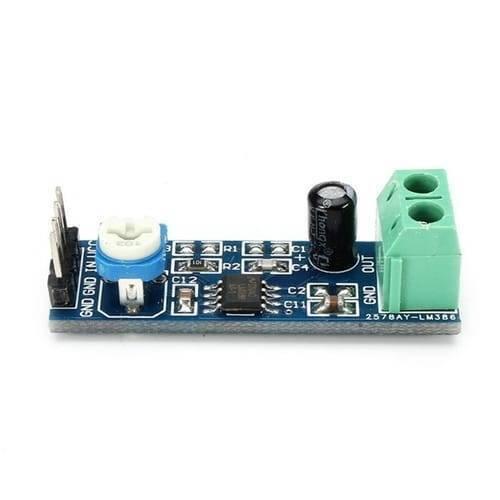 Audio Amplifier Module LM386 5-12V 10k Adjustable Resistance - a blue rectangular circuit board with a white adjustable potentiometer, a black capacitor, and a green terminal block.