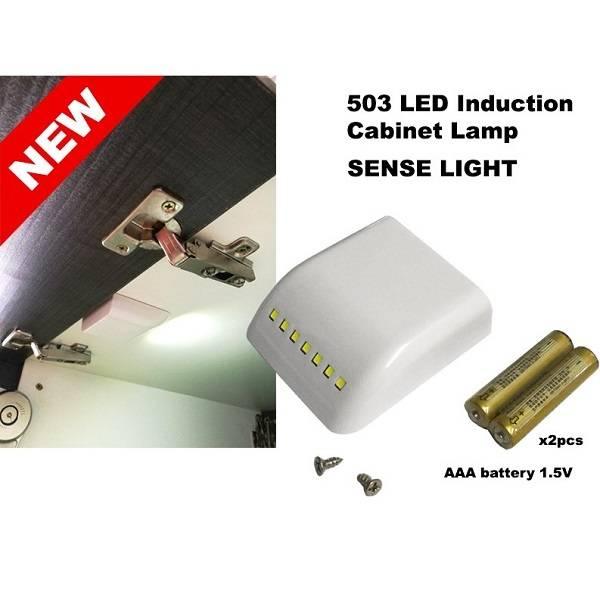 Auto Smart LED Induction PIR Motion Sensor Lamp Light For Drawer Cabinet Cupboard Closet Doors - a white LED cabinet lamp, two AAA batteries, and two small screws.