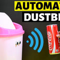 Automatic Object Sensing Smart Dustbin Project Parts - with two circular sensors on the front, shown detecting a Coca-Cola can.