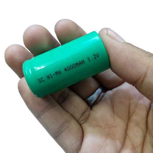 Battery 1.2V 2000mAh (sc) - shown as a green cylindrical SC Ni-MH battery held in a hand, with the text "SC NI-MH 4000MAH 1.2V" printed on the side.