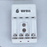 Battery Charger With Discharge Function For AA, AAA, 9V DC 20mA Rechargeable Batteries - white four-slot charging unit with two 9V battery terminals.