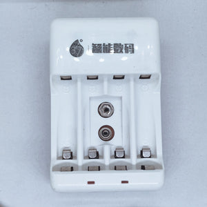 Battery Charger With Discharge Function For AA, AAA, 9V DC 20mA Rechargeable Batteries - white four-slot charging unit with two 9V battery terminals.