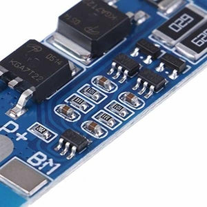 Battery Protection Board 2s 8A BMS For 18650 Lithium Ion Cells HX-2S-JH10 - a close-up view of the blue circuit board with electronic components.