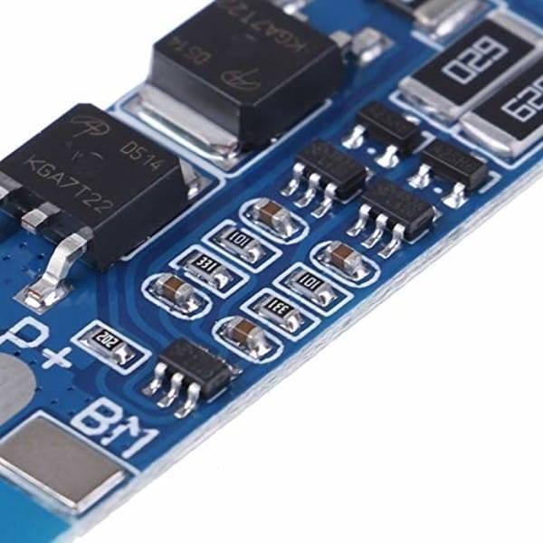 Battery Protection Board 2s 8A BMS For 18650 Lithium Ion Cells HX-2S-JH10 - a close-up view of the blue circuit board with electronic components.