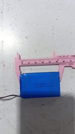 Battery Wholesale 2s 7.4V 1000mAh Rechargeable LiPo Lithium Battery Pack With JST 2.54mm Connector - shown being measured with pink calipers, displaying the model number CLY503450 and a wire connector.