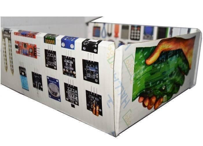 Beginner Arduino Uno Starter Kit - a white exterior printed with various electronic sensor module icons and a hand graphic.
