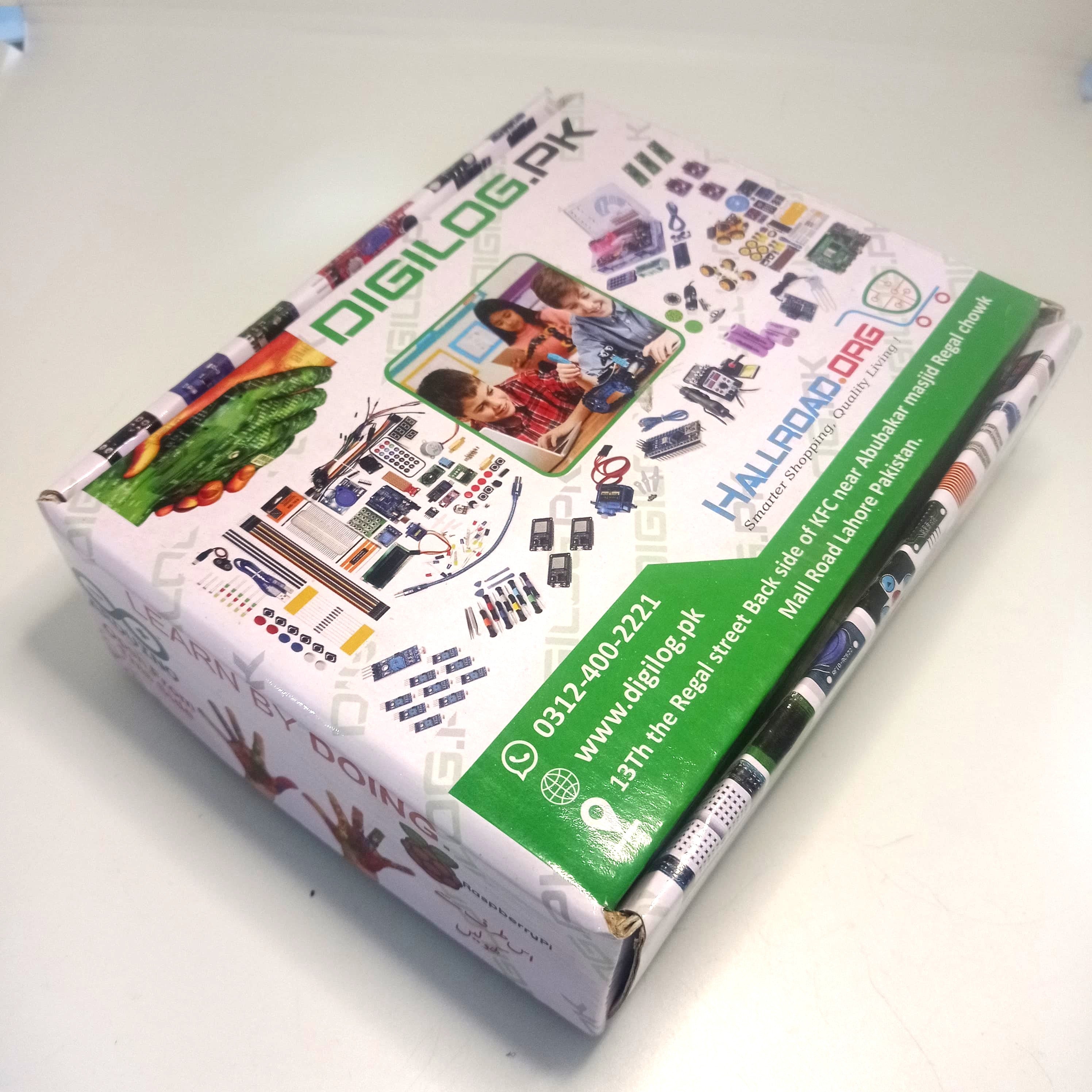 Beginner Arduino Uno Starter Kit Pack Of Arduino Products For Beginners - a white rectangular cardboard box featuring product imagery, branding, and contact information for Digilog.pk.