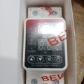 Bevav 63amp Adjustable Under Over Voltage Protector Relay - in its white box, showing a digital display, four control buttons, and input/output terminals for N and L wires.