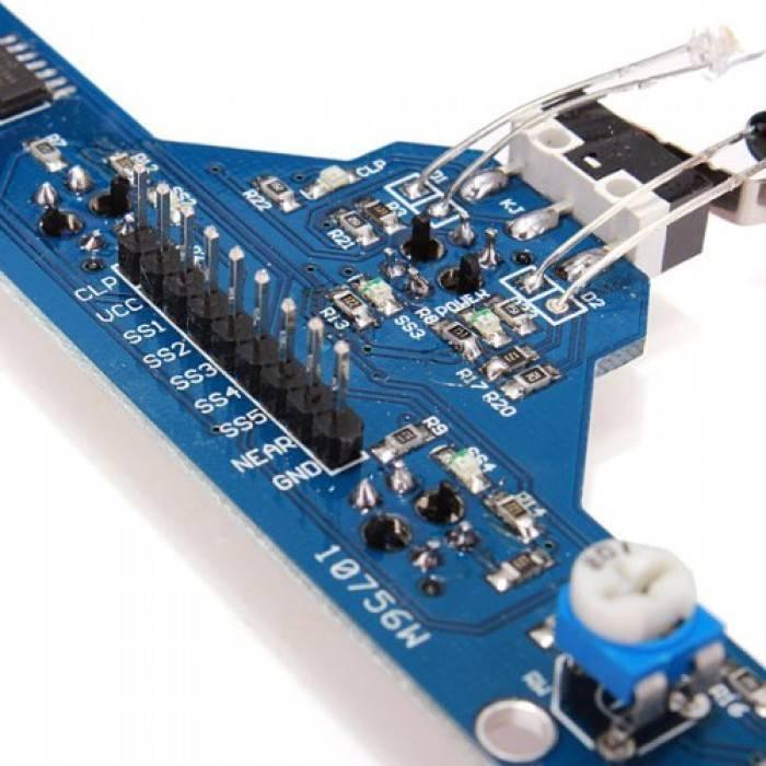 Bfd-1000 5 Way Line Tracking Sensor Module Line Following Module - a blue circuit board with a row of pins, an adjustable potentiometer, and two small LED components.