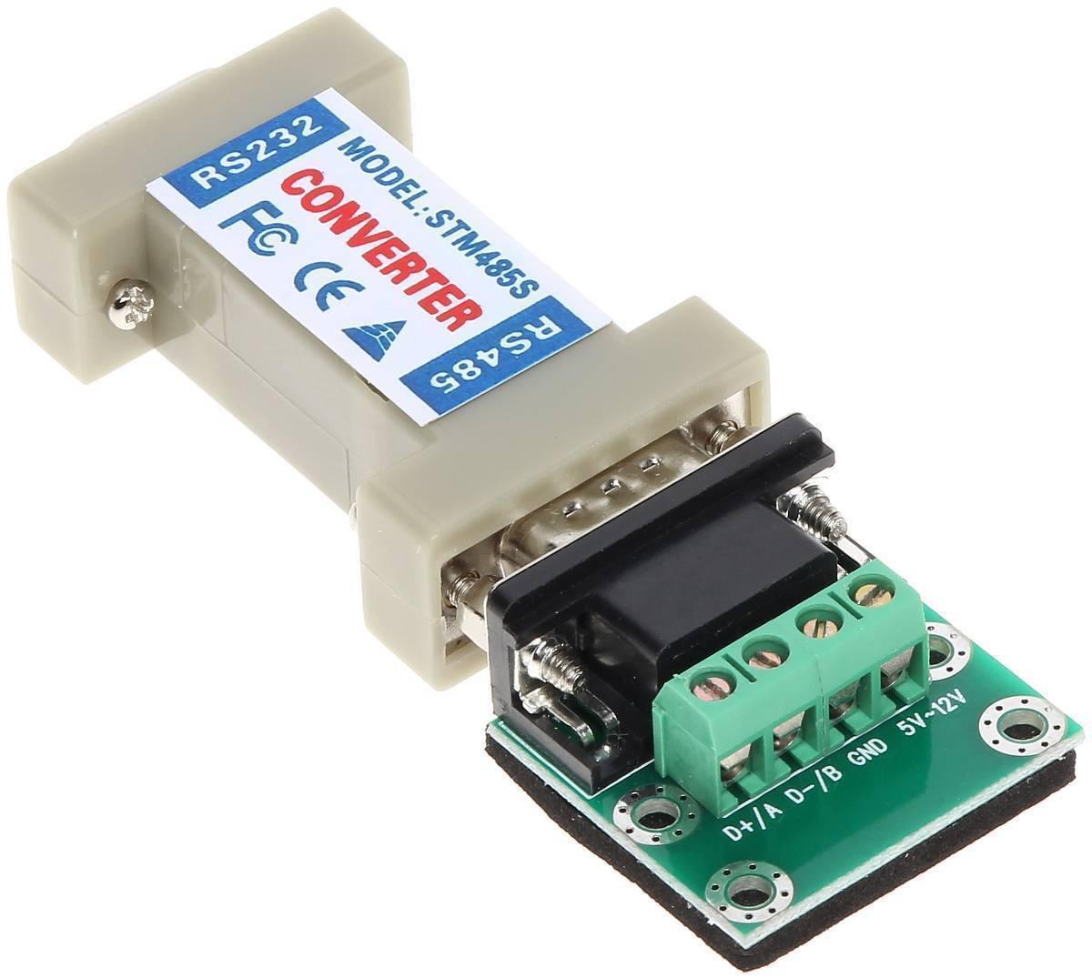 Bi Directional Communication Data RS232 To RS485 Serial Converter STM485S - a beige DB9 connector attached to a green terminal block adapter.