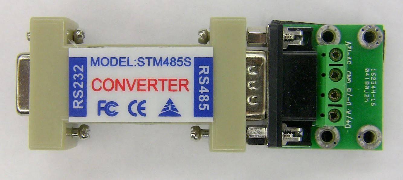 Bi Directional Communication Data RS232 To RS485 Serial Converter STM485S - a beige and green adapter with a DB9 connector and a four-pin terminal block.