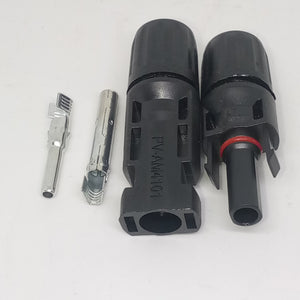 Big Size 50MMX17MM 30A 1500V Male Female MC4 Connector For Solar Panel DC Wire Cable - two black plastic housings and two metal contact pins arranged on a white surface.
