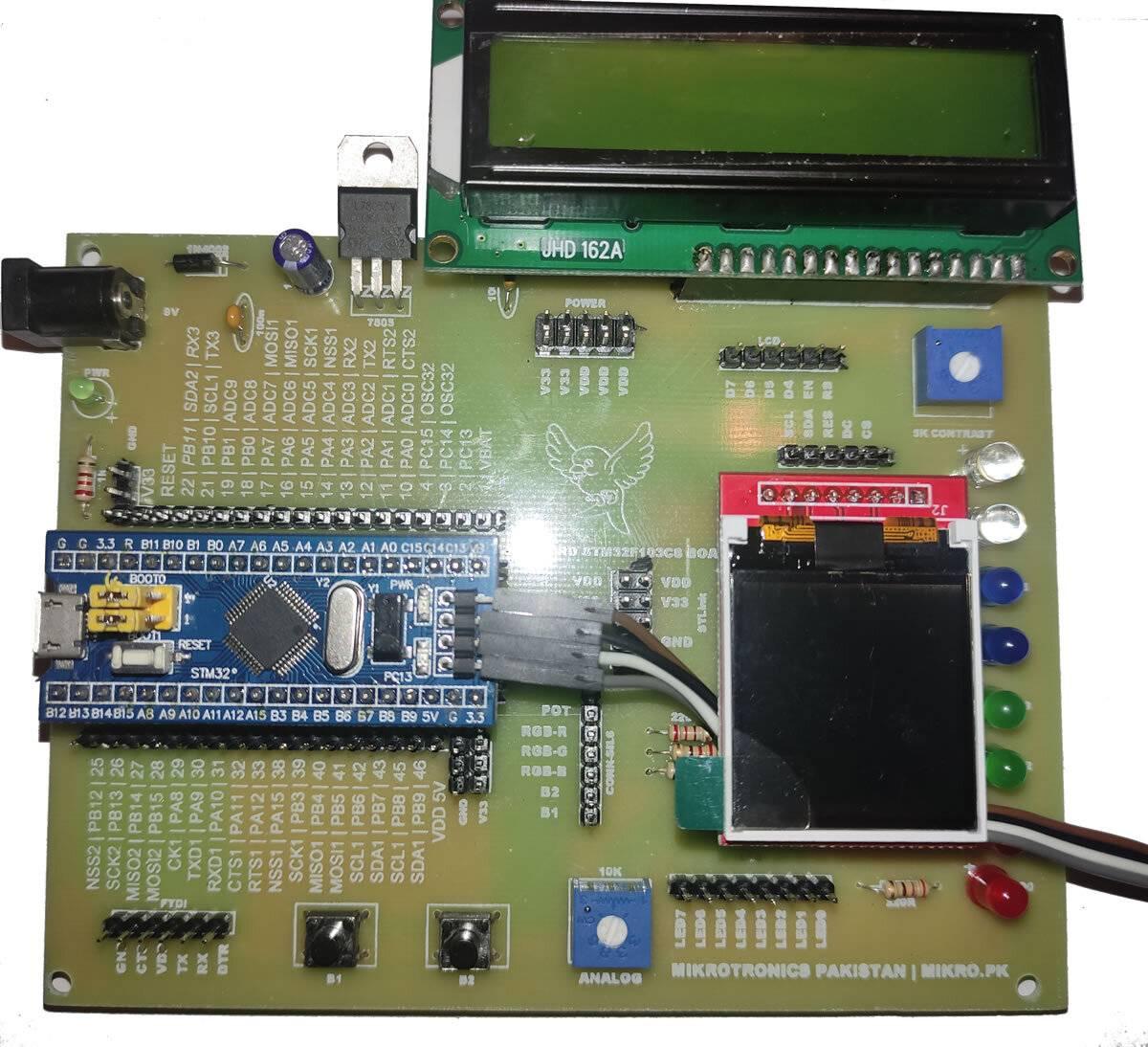 Bluebird STM32F103C8 Bluepill Host Playground Made - an STM32 development board, a green 16x2 LCD, a small color display, buttons, and LEDs.