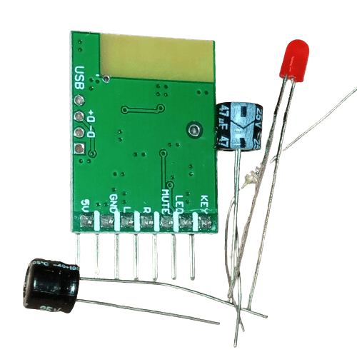 Bluetooth 4.0 Audio Receiver Stereo Wireless Speaker Module - the green circuit board, two electrolytic capacitors, and a red LED.