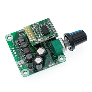 Bluetooth 4.2 TPA3110 15W+15W Digital Stereo Audio Power Amplifier Board Module 12V-24V Car For USB Speaker,portable Speaker - a green circuit board with a black volume knob and antenna.
