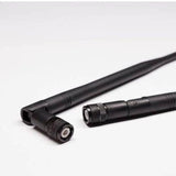 BNC Type 2.4GHz WiFi Wireless Rubber Duck Foldable Signal Antenna For Wi-Fi Router Without Antenna - two black, foldable antennas with BNC connectors on a white background.