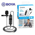 Boya BY-M1 Omnidirectional Lavalier Microphone (black) - shown as a black wired lapel mic with a power module and its retail packaging box featuring a woman using the device.