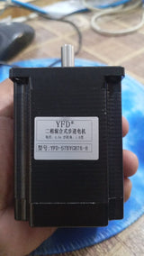 Brand New High Quality 57BYGH76 NEMA 23 Bipolar Stepper Motor 76mm 4.0A 1.8nm - a black square-bodied motor with a metal shaft and a white label showing specifications in Chinese and English.